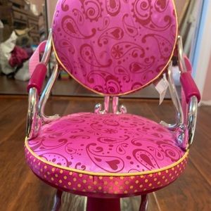 American girl doll chair along with Jo-Jo siwa watch